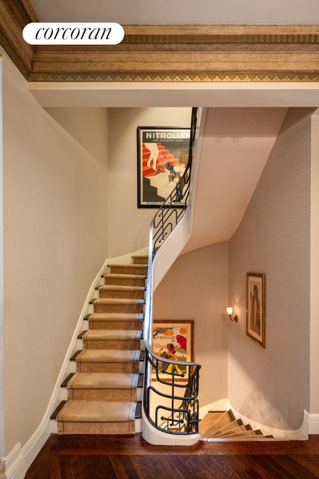 49 E 80th St, New York City, NY 10075 - stairs with baseboards and wood finished floors
