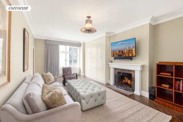 49 E 80th St, New York City, NY 10075 - living room with visible vents, a fireplace, ornamental molding, and baseboards