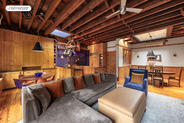 49 E 80th St, New York City, NY 10075 - living area featuring light wood-style flooring, ceiling fan, and a wall mounted air conditioner