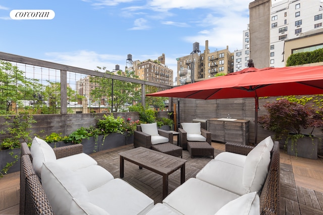 49 E 80th St, New York City, NY 10075 - view of patio featuring a view of city, a sink, and an outdoor hangout area