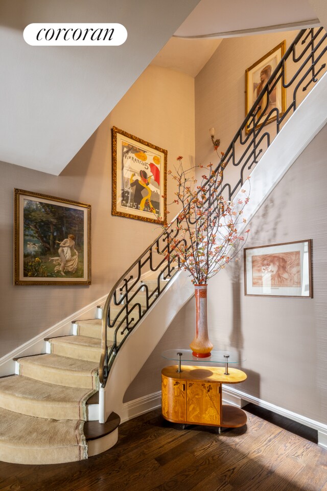 49 E 80th St, New York City, NY 10075 - staircase with baseboards and wood finished floors