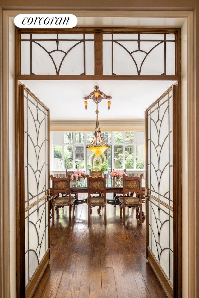 49 E 80th St, New York City, NY 10075 - dining area featuring dark wood-style flooring and a wealth of natural light