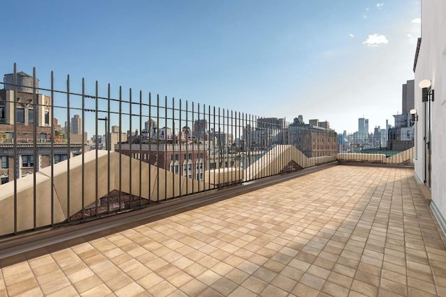 view of patio / terrace with a balcony