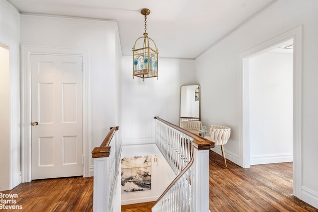 home office with dark hardwood / wood-style flooring and ornamental molding