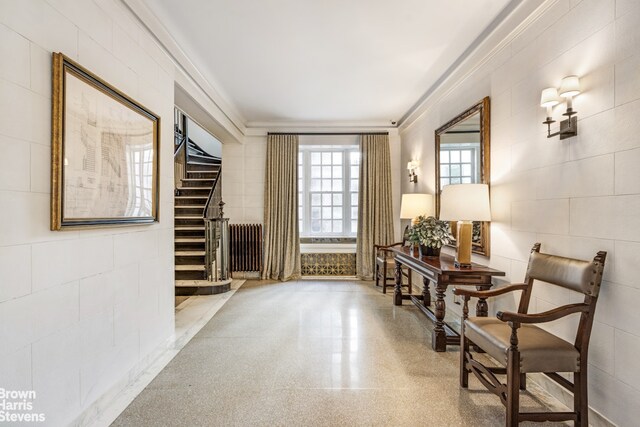 dining room with wood-type flooring, sink, and beamed ceiling