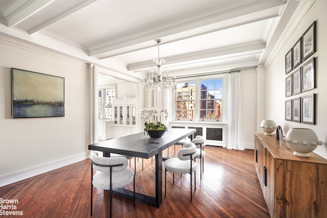 corridor featuring dark wood-type flooring, ornamental molding, and a notable chandelier