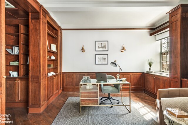 carpeted foyer entrance featuring beam ceiling