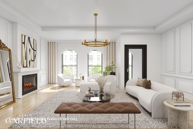 living room with a warm lit fireplace, a raised ceiling, a chandelier, and light wood-style floors