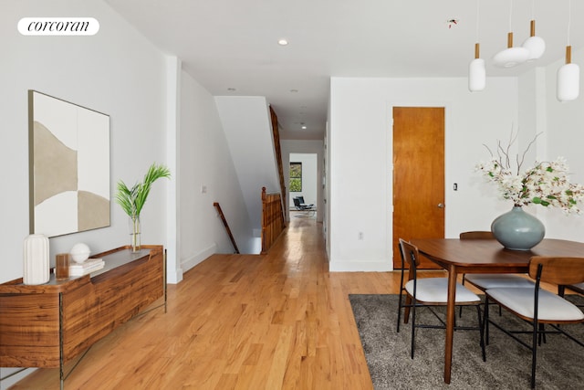 dining area featuring recessed lighting, baseboards, visible vents, and light wood finished floors