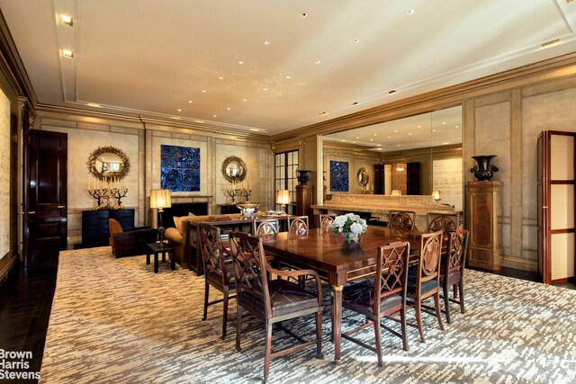 bedroom with carpet flooring, ceiling fan, and ornamental molding