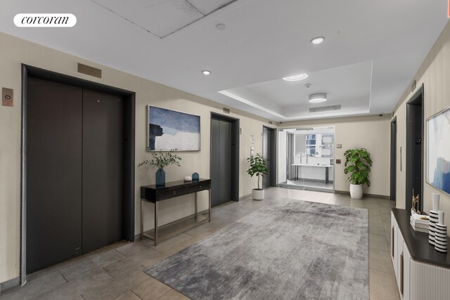 interior space featuring dark colored carpet