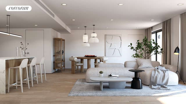 living room with light hardwood / wood-style floors