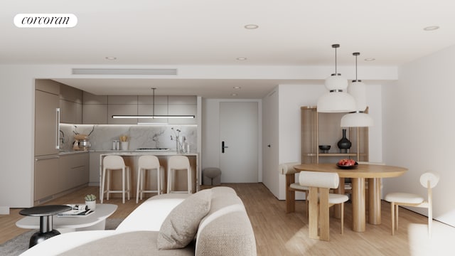 dining space with light hardwood / wood-style floors