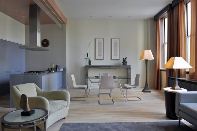 sitting room featuring light hardwood / wood-style flooring