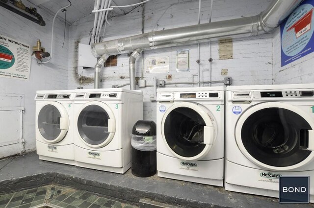 laundry room featuring washer and dryer