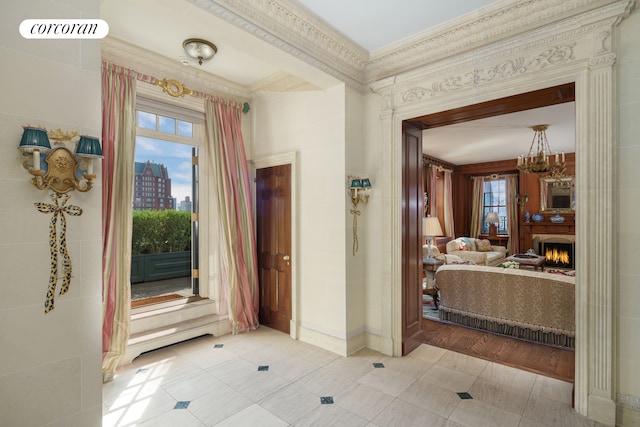 895 Park Ave Phc, Phc, New York City, NY 10075 - hall with an inviting chandelier and light tile patterned floors