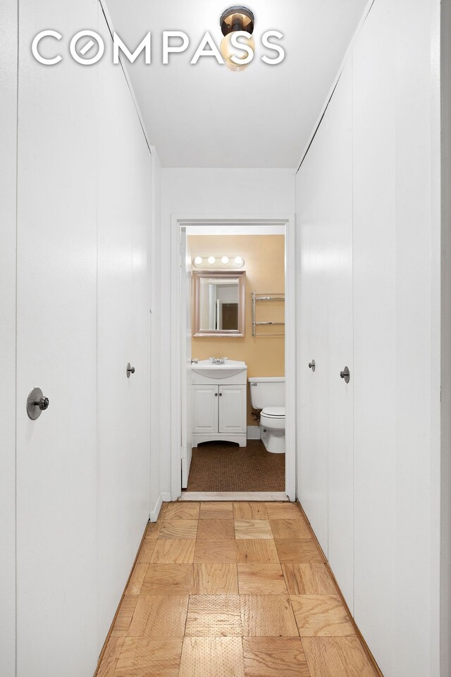 hallway with sink