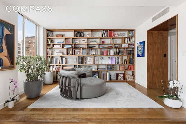 living area featuring hardwood / wood-style floors