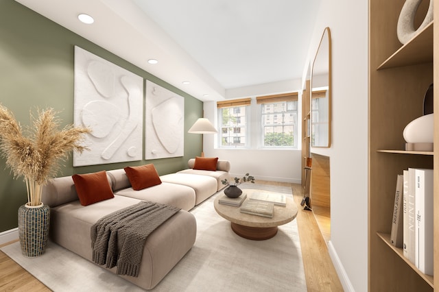 living area featuring recessed lighting, wood finished floors, and baseboards