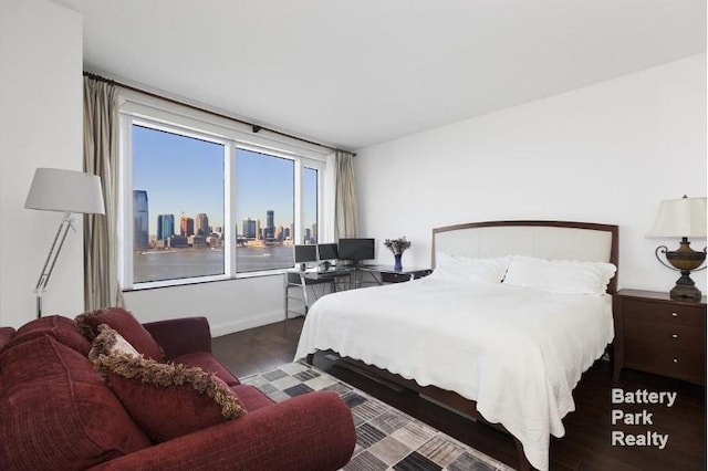 bedroom with wood finished floors