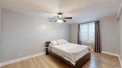 bedroom with hardwood / wood-style flooring and ceiling fan