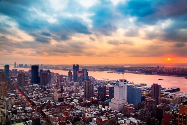 property's view of city with a water view