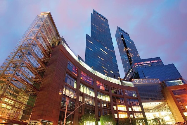 view of outdoor building at dusk