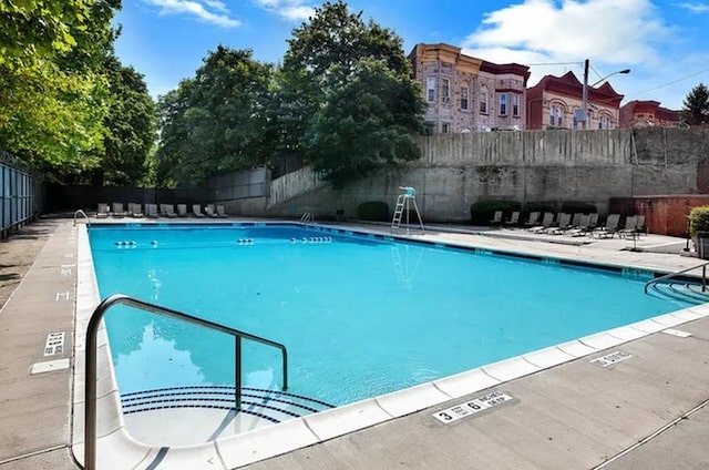 view of pool featuring a patio