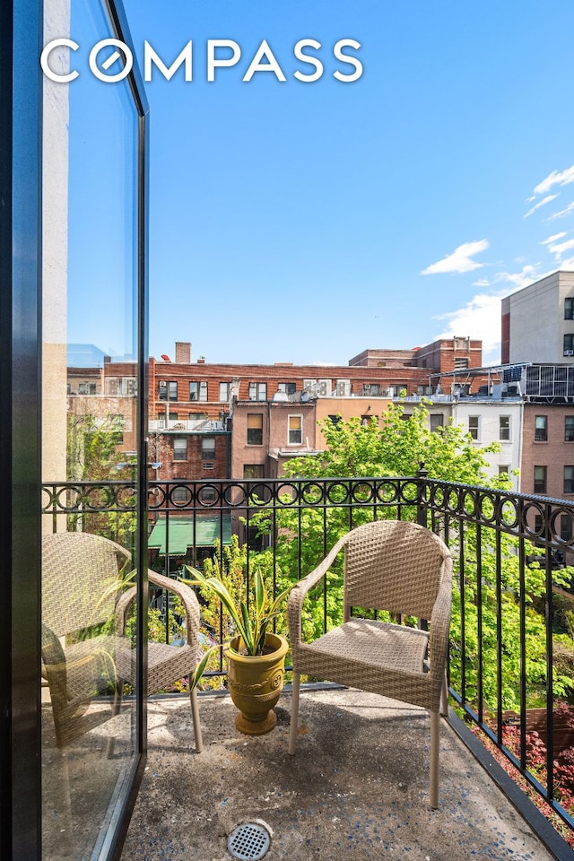 balcony featuring a residential view