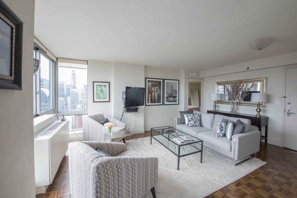 living room with dark parquet floors