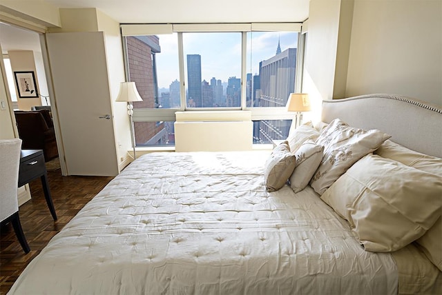 bedroom with a city view