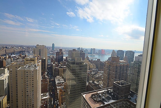 property's view of city with a water view