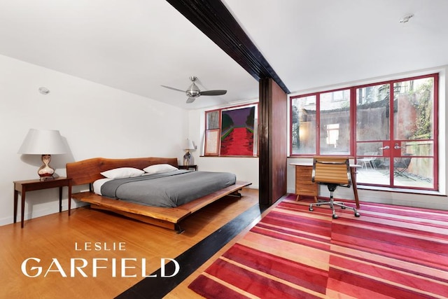 bedroom with wood finished floors