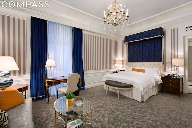 carpeted bedroom with crown molding and an inviting chandelier