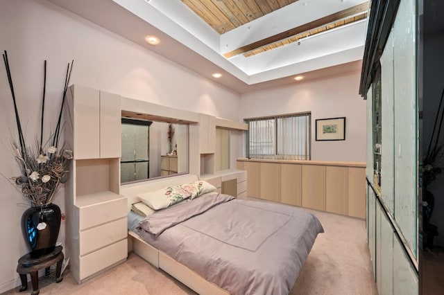 bedroom featuring recessed lighting, beamed ceiling, wooden ceiling, and light colored carpet