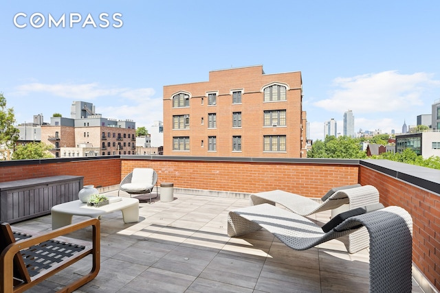 balcony featuring a view of city