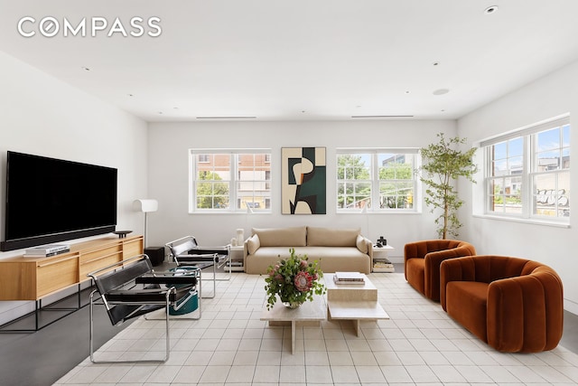 living room featuring plenty of natural light