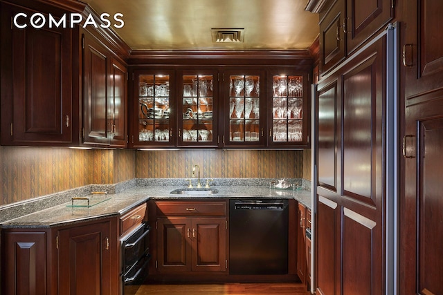 bar with dishwasher, wet bar, and a sink