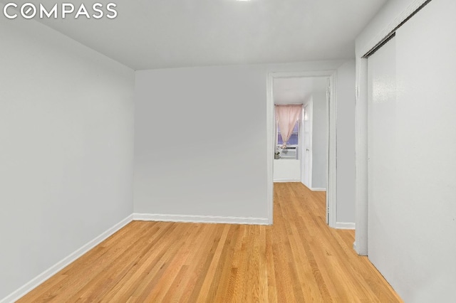 empty room featuring light hardwood / wood-style floors