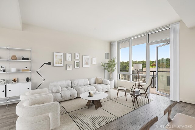 living room with wood finished floors