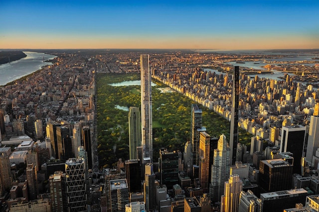 property's view of city with a water view