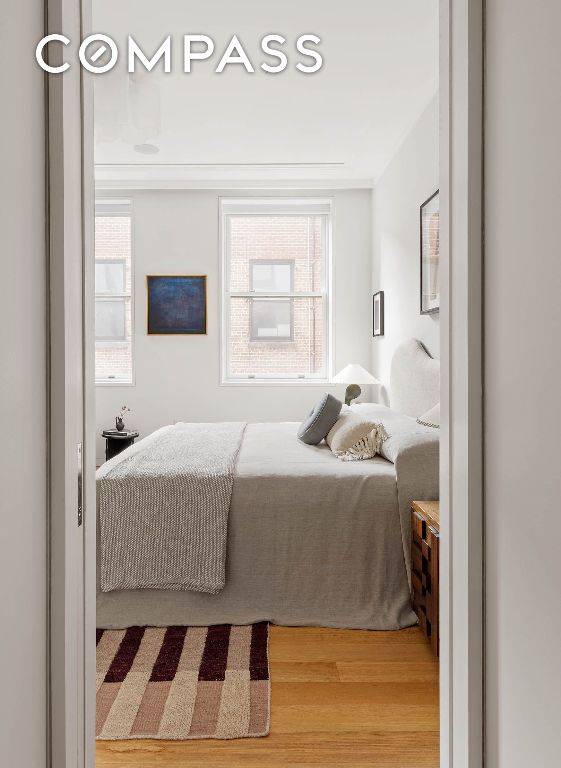 bedroom featuring wood finished floors