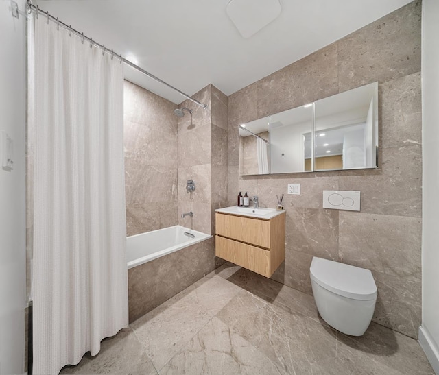 30-05 Vernon Blvd Unit 7-E, New York City, NY 11102 - full bathroom featuring tile walls, tiled shower / bath, vanity, and toilet