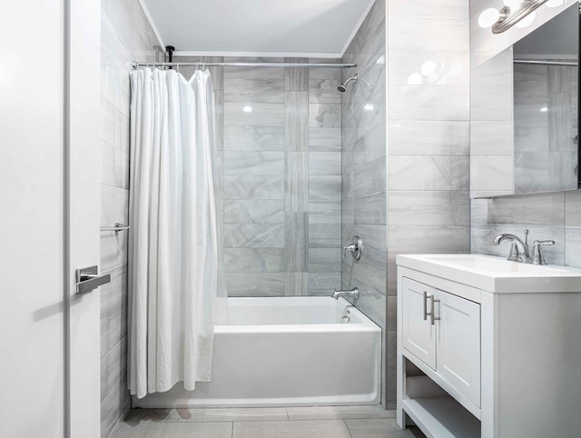 30-25 21st St Unit 2-A, New York City, NY 11102 - bathroom featuring vanity, shower / bath combo, ornamental molding, and tile patterned floors