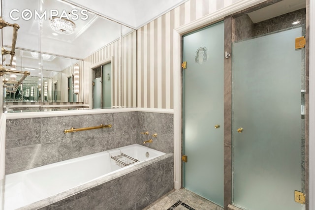 2 E 55th St Unit 909W14, New York City, NY 10022 - full bathroom with a bath and wallpapered walls