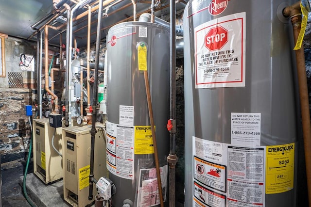 utility room featuring gas water heater