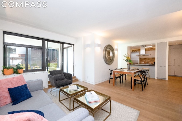 living room with light hardwood / wood-style floors