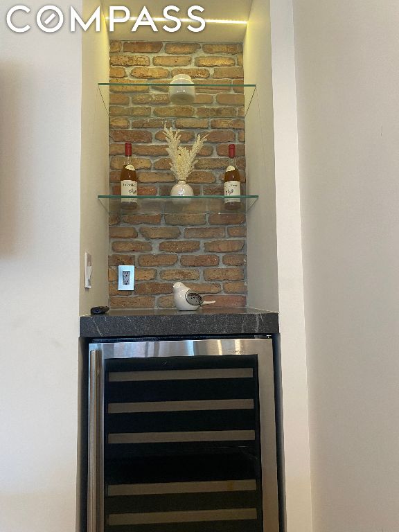 room details featuring bar and beverage cooler