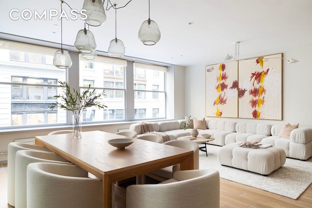 living room with light hardwood / wood-style flooring