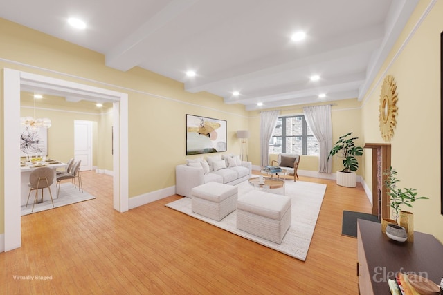 living room featuring beam ceiling and light hardwood / wood-style flooring